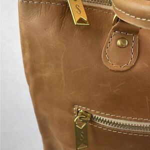 Sseko saddle brown leather convertible tote to backpack with gold hardware